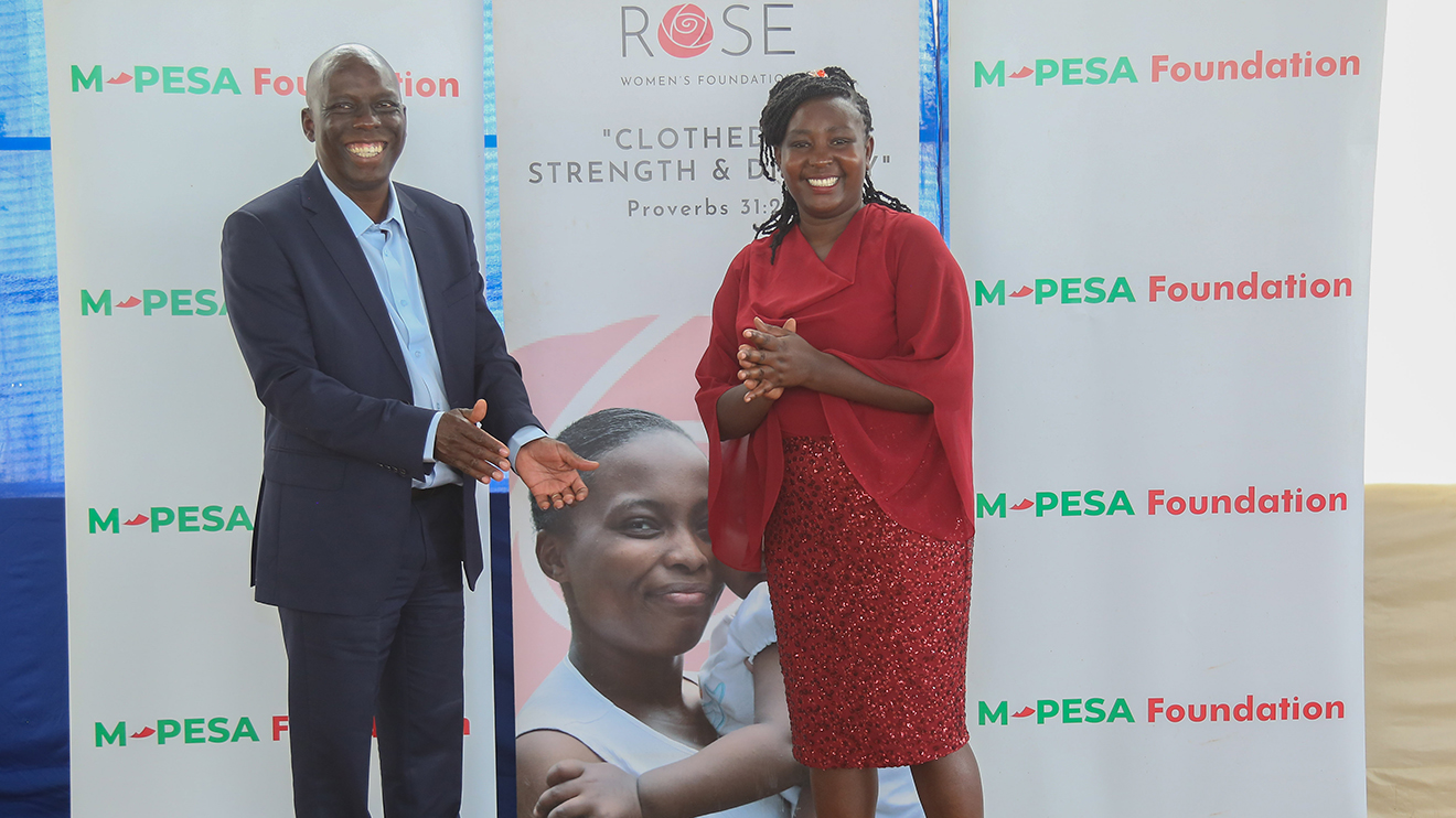John M Ohaga share a light moment with ROSE women’s Foundation HR/ Operations Manager, Ekra Mwangi. PHOTO/COURTESY